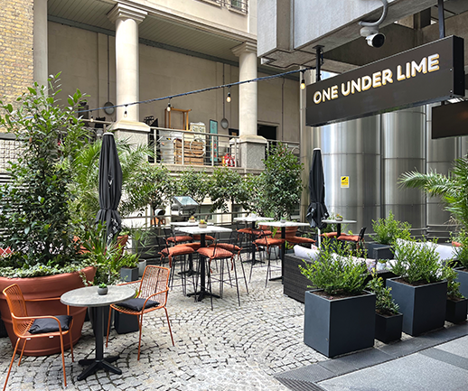 One Under Lime outside with sign